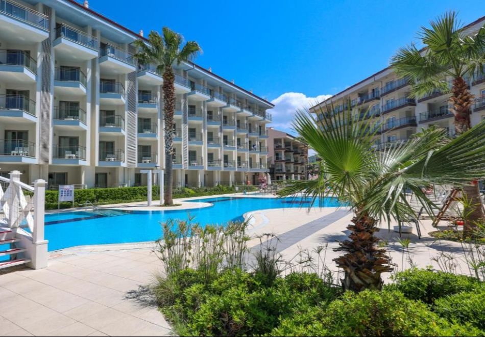 През 2026 - 7 дневна Аll Inclusive почивка на човек в RAMADA HOTEL & SUITES BY WYNDHAM 5*, Кушадасъ, Турция + автобусен транспорт. Дете до 11.99 безплатно