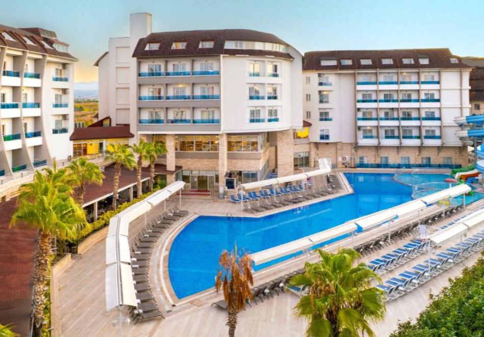 Почивка в Сиде, Турция: Автобусен транспорт от Варна и Бургас + 7 нощувки на човек на база Аll Inclusive + басейни в RAMADA RESORT BY WYNDHAM SIDE 4*, снимка 2