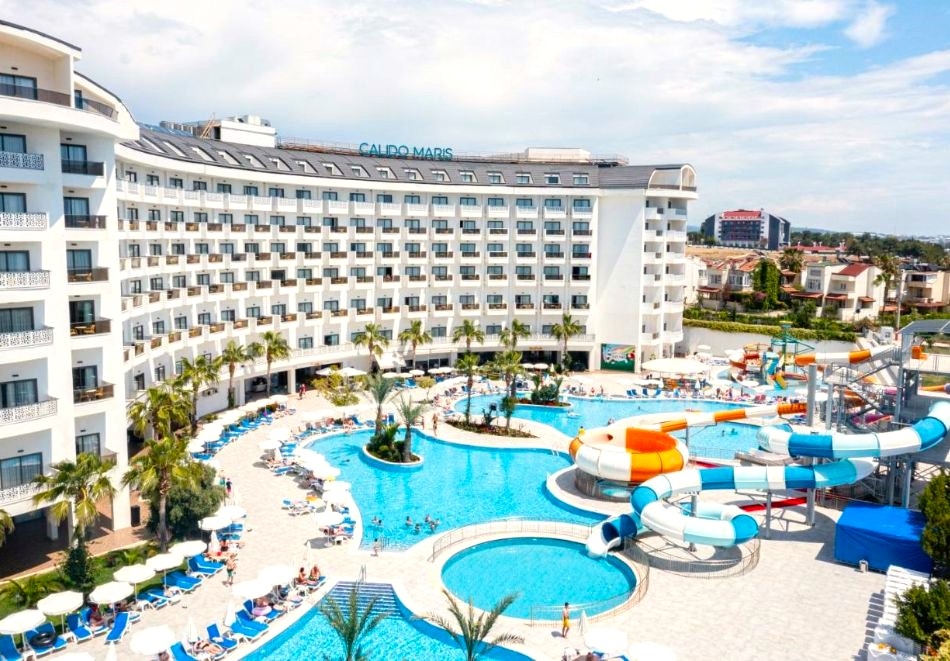 На 50м. от плажа в Сиде, Турция: Транспорт + 7 нощувки на човек на база Ultra All inclusive + басейни и водни пързалки в хотел CALIDO MARIS 5*. Дете до 10.99 безплатно!