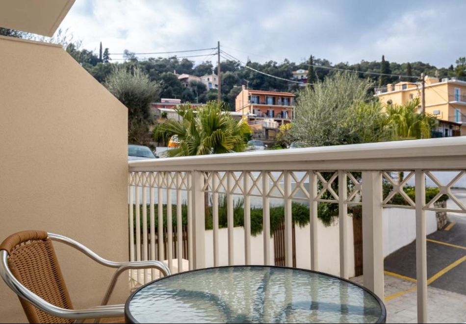 На първа линия на о.Корфу, Гърция: Нощувка на човек със закуска и възможност за вечеря + басейн в Oasis Hotel. Дете до 11.99г. БЕЗПЛАТНО!, снимка 7